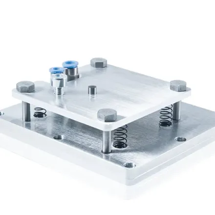 APX V tamp pad, spring-mounted