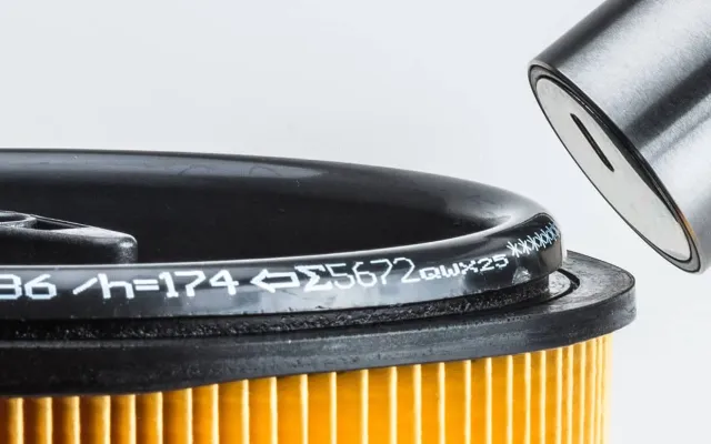 Small code on a black filter ring