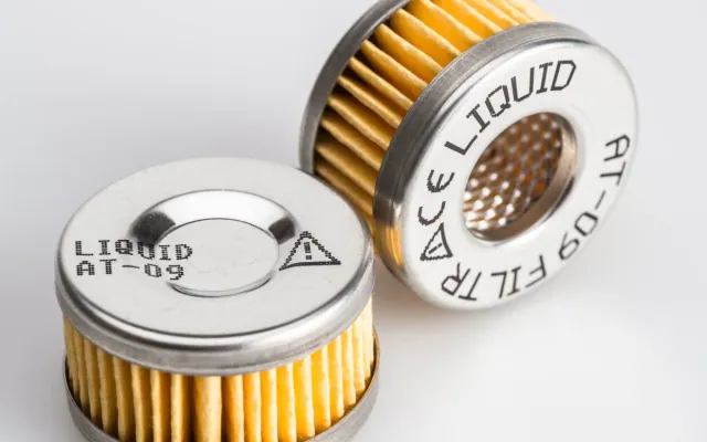 Text on metal filter caps