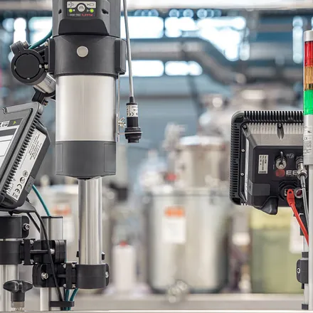 Two EBS-1600 controllers mounted on a production line