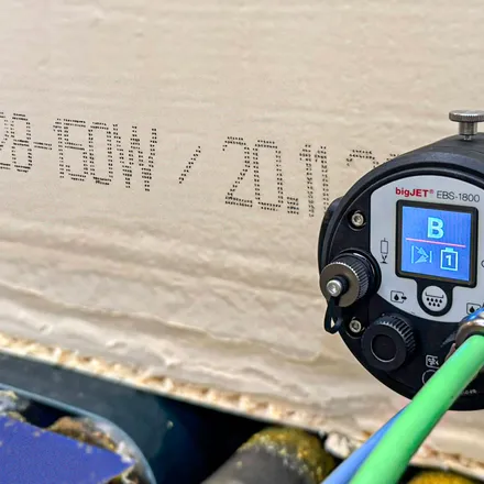 EBS-1800 printhead marking a large-character code on a foam board