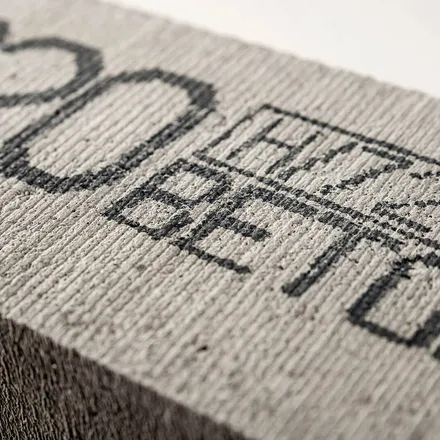 Large characters printed by the Handjet EBS-260 on a concrete block