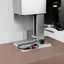 SpeedMate eLinear tamp pad lowering a label onto the top of a carton
