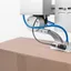 SpeedMate eSwing arm applying a label to the top of a carton